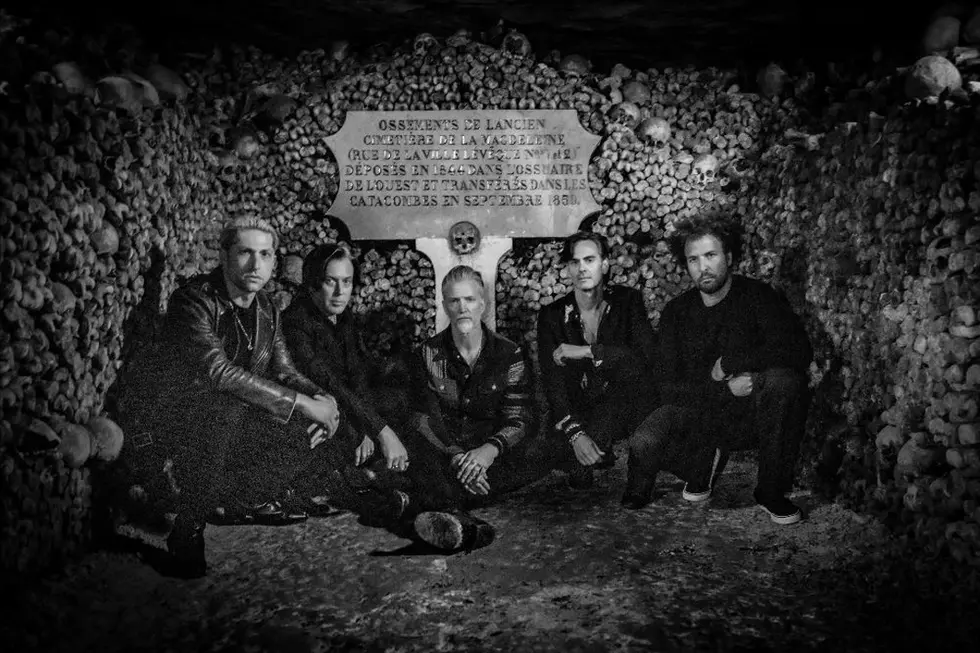 Queens of the Stone Age, ‘Alive in the Catacombs': Review